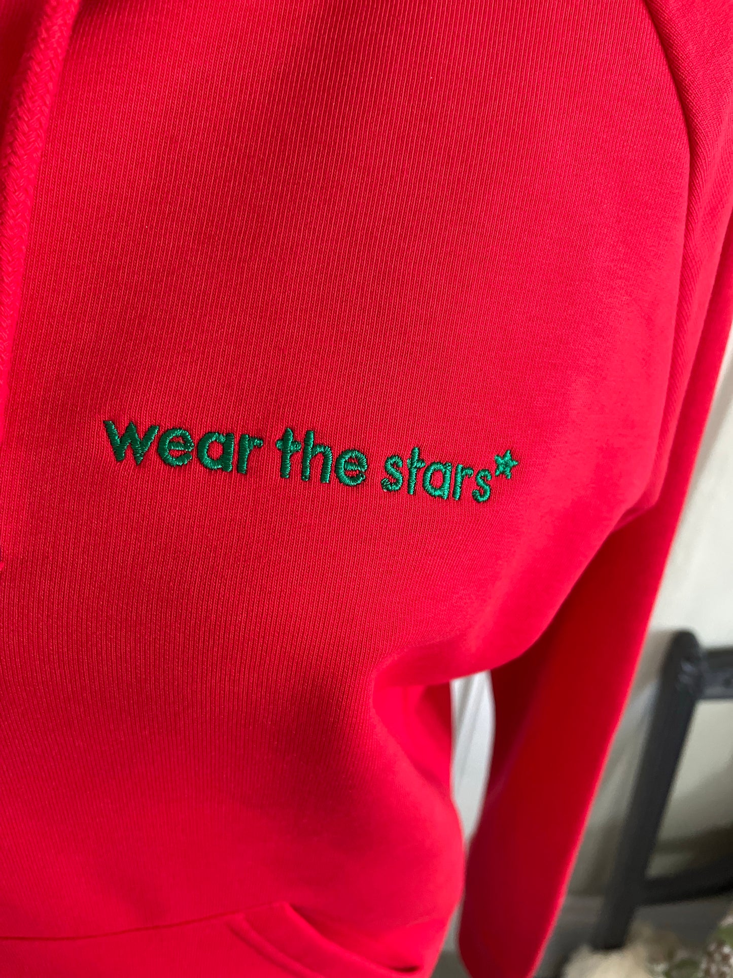 Meet Our Bright Red Hoodie with Forest Green Wear the Stars logo